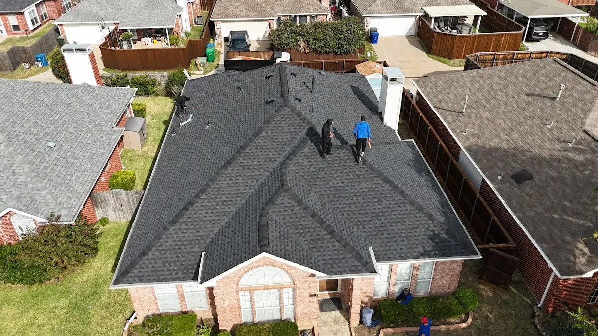 Slate & Tile Roof Repair work in progress on a Minot property